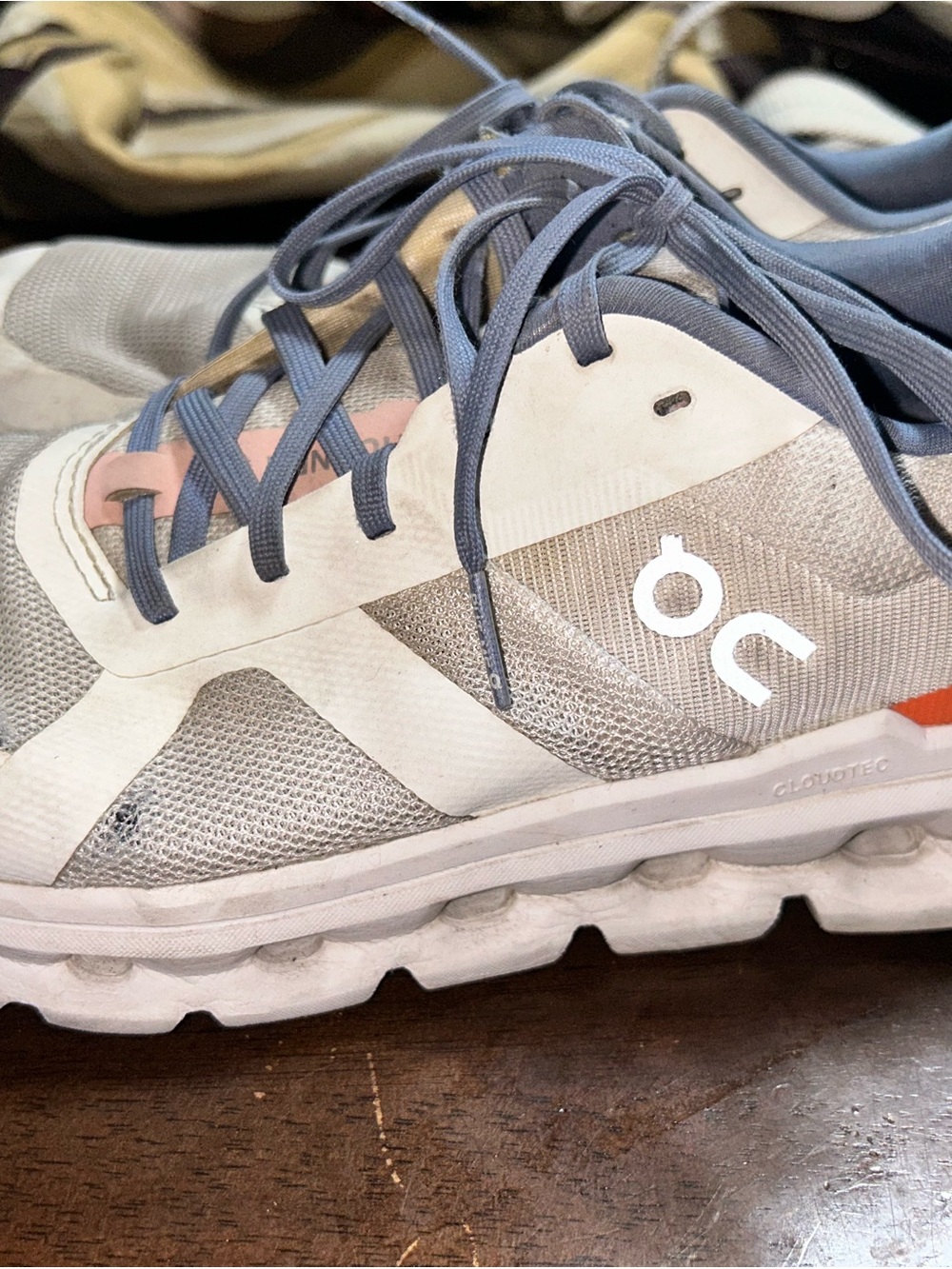 On Running White Sneakers with Light Blue Interior and Pink Laces